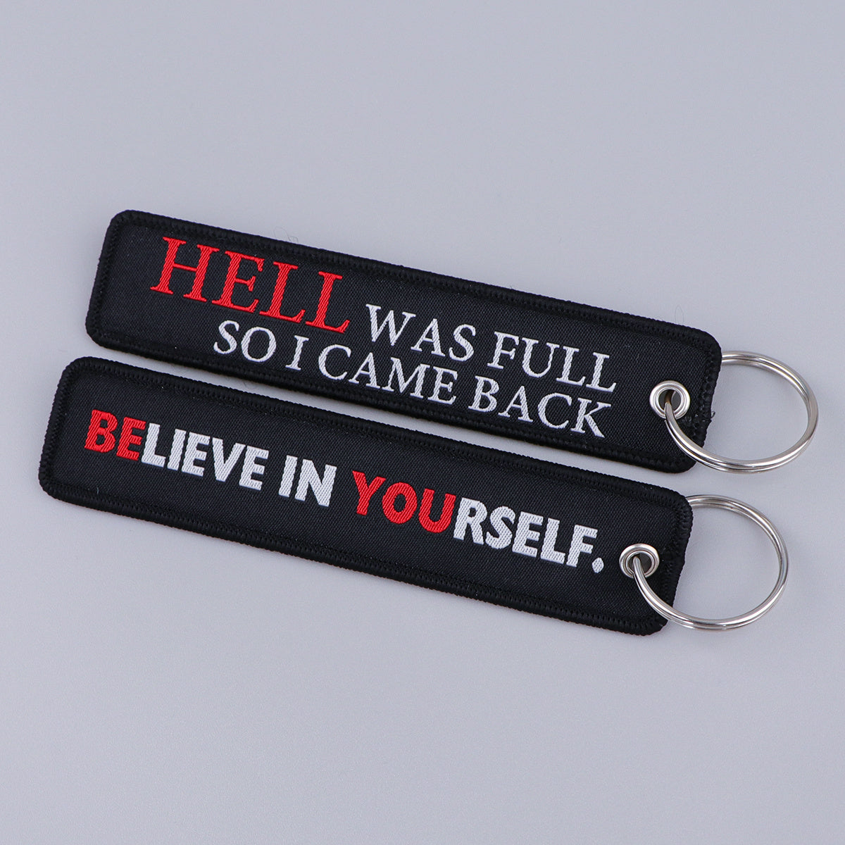 Porta-chaves Believe Yourself e Hell